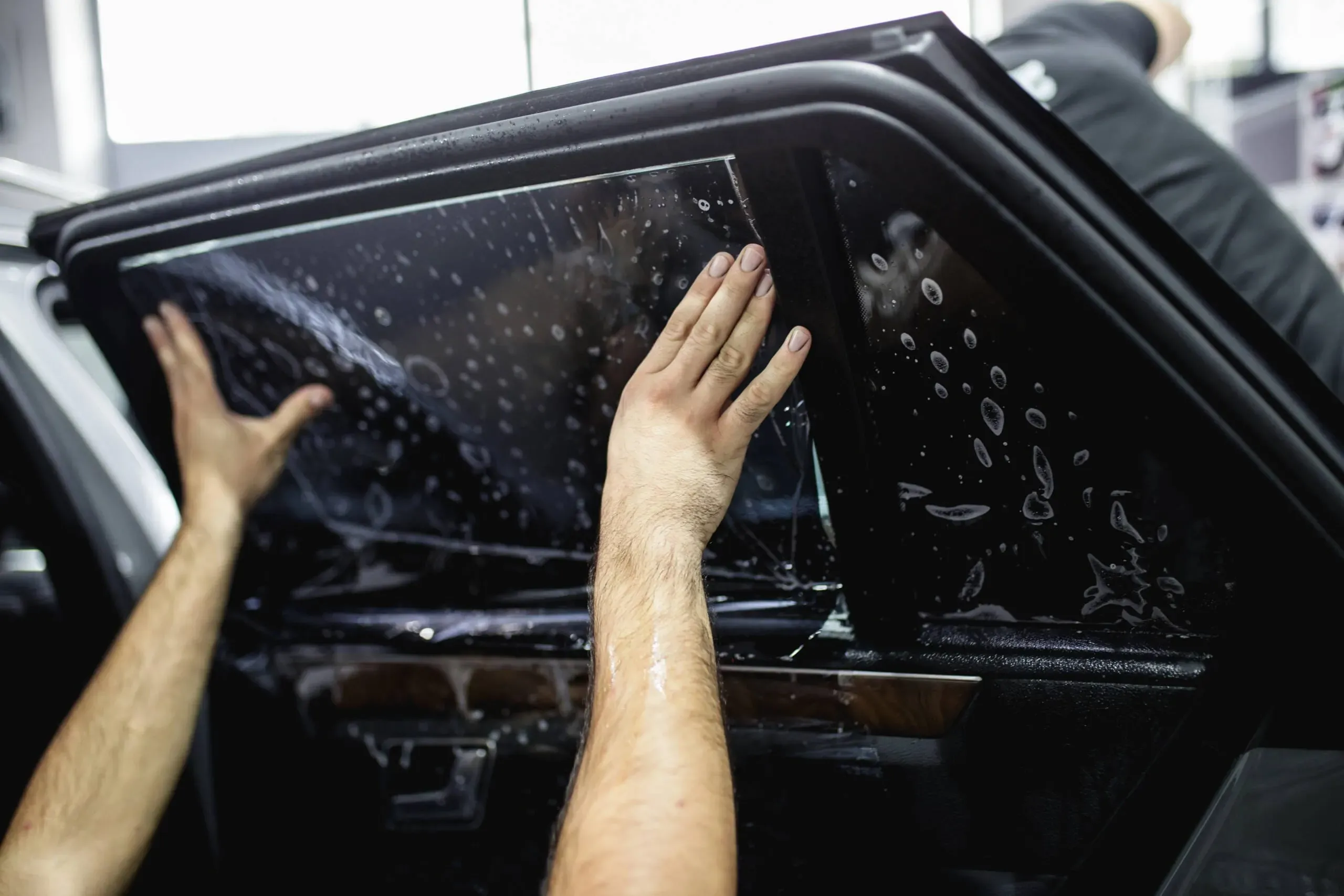 Window tint installation closeup
